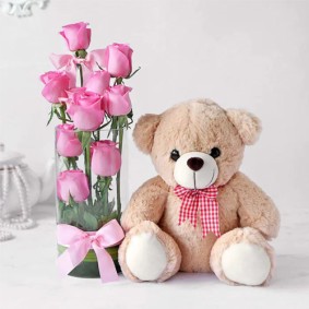 Pink rose with teddy